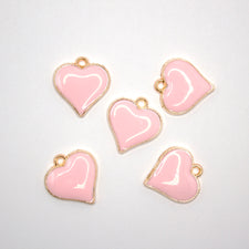 5 heart shaped pink and gold jewelry charms