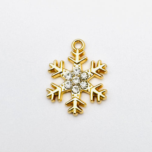 light gold snowflake shaped pendant with crystal rhinestones