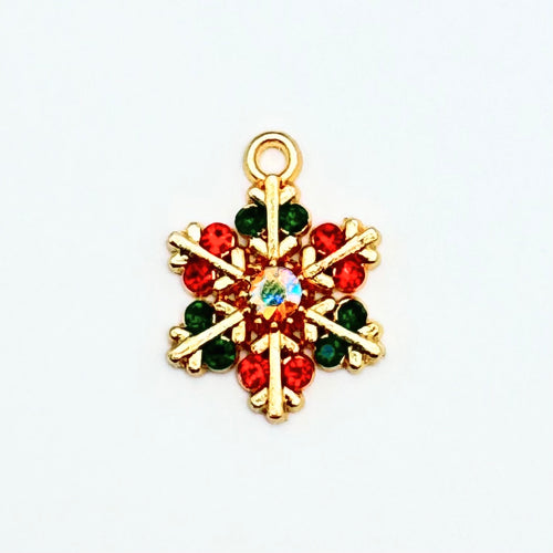 gold snowflaked shaped jewelry charm with red and green crystal rhinestones