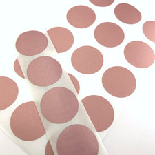 round stickers that are rose gold colour