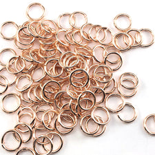 rose gold coloured round jump rings