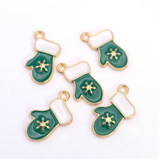 green white and gold jewelry charms shaped like mittens