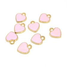 pink and gold heart shaped jewelry charms