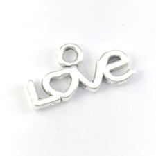 silver colour charm that in the shape of the word love