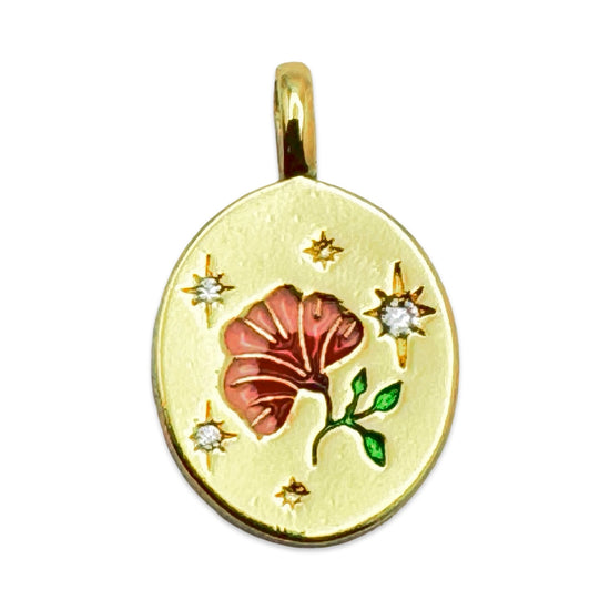 gold oval shaped pendant with enamel floral and clear cubic zirconia 