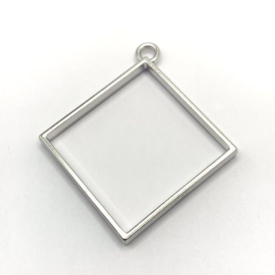 silver rhombus shaped open back bezel