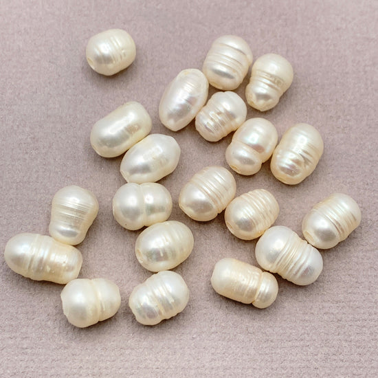 oval shaped pearl colour jewelry beads