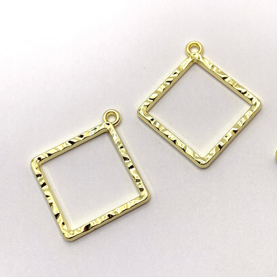 gold rhombus shaped open back bezel pendants