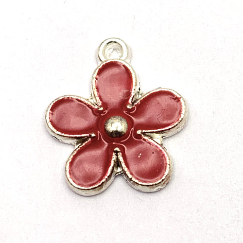 red and silver flower shaped jewelry charm