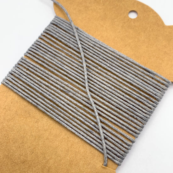 grey cord wrapped on cardstock