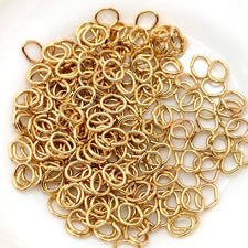 light gold coloured oval jump rings