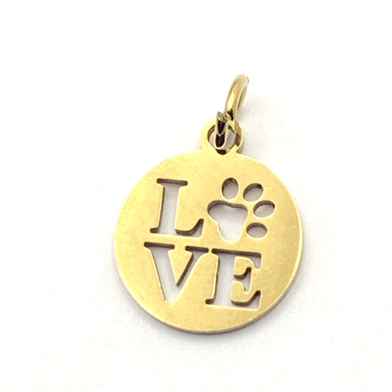 gold colour round jewelry charm with a paw print and word love