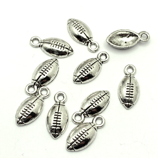 football shaped silver jewerly charms
