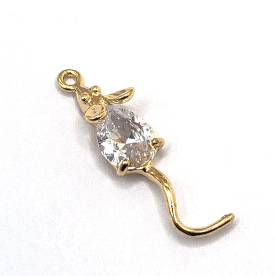glass and gold colour jewerly charm that looks like a mouse