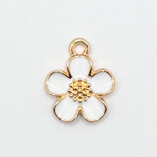 five petal white and gold flower shaped jewelry charm