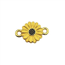 Yellow and gold connector jewelry charm that looks like a daisy flower