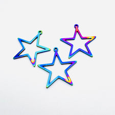 three rainbow coloured star shaped jewelry charms