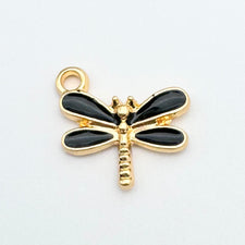 black and gold dragonfly shaped jewelry charms