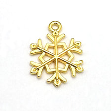 gold snowflake shaped jewelry pendant