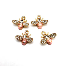 Pink and gold bee shaped jewelry charms