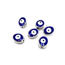 blue and silver oval jewelry beads with white evil eye