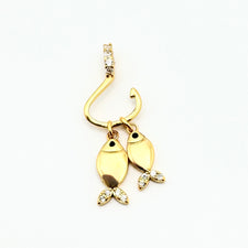 gold hook shaped jewelry charm with 2 fish shaped charms attached to hook