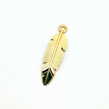 gold, green, white and brown feather shaped jewelry charms