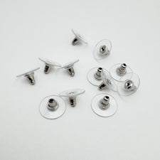 silver earring backs with clear plastic pads