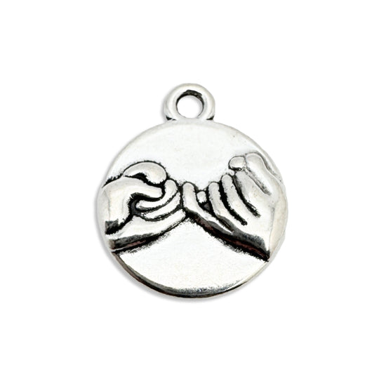 Silver jewelry charm with a symbol of pinky promise 