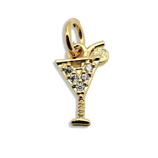 gold charm in the shape of a drink glass with tiny clear cubic zirconia rhinestones