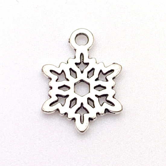 silver snowflake shaped jewelry charm