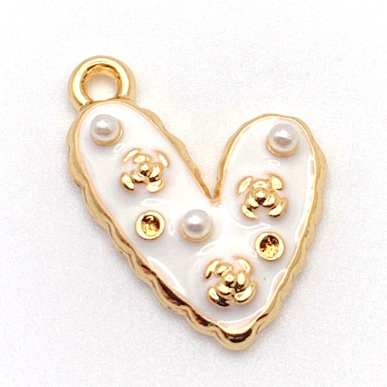 white and gold heart shaped jewelry pendants