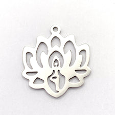 silver jewerly charms in the shape of a lotus flower with yoga figure