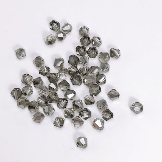 pile of grey glass jewelry beads