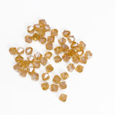 4mm bicone shaped beige beads
