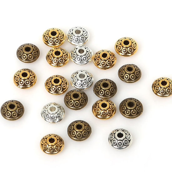 bronze, silver and gold coloured metal jewelry beads