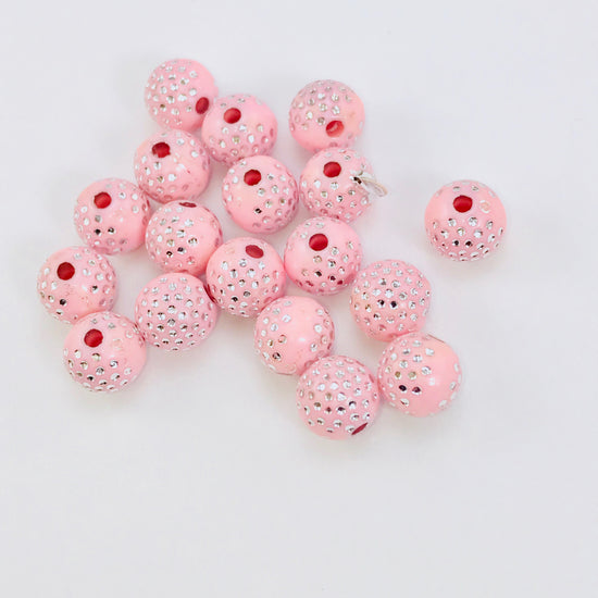 light pink acrylic round beads with silver sparkles