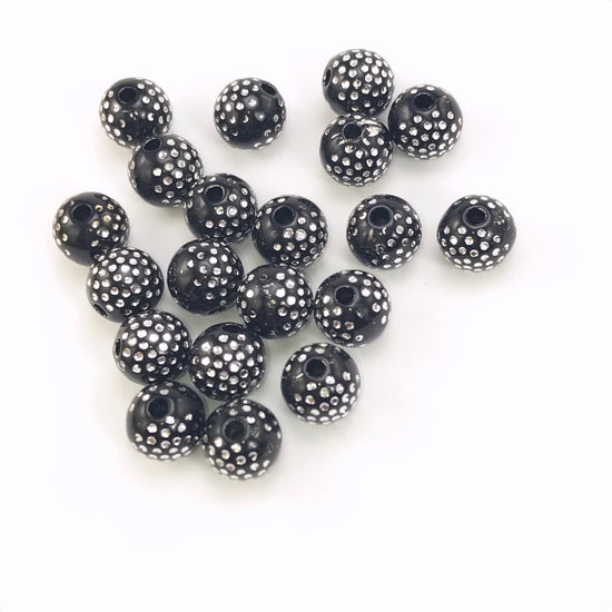 black round acrylic beads with silver sparkles