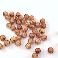 jewelry beads that have a brown marble texture
