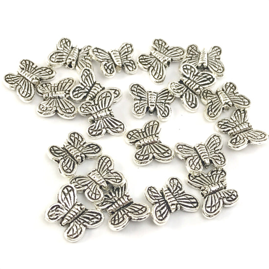 butterfly shaped silver colour jewelry  beads