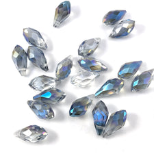 drop shaped jewerly beads that are clear with blue accents