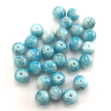 blue and white jewerly beads that have a marbled look