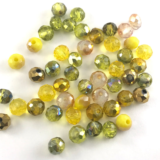 mixture of jewerly beads in various shades of yellow