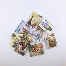 wooden buttons that look like vintage stamps