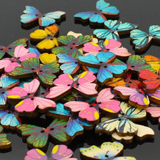 butterfly shaped wooden buttons in various colors