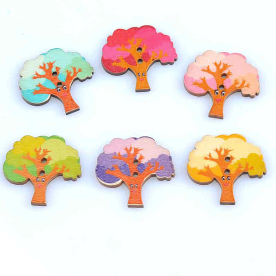 multi coloured wood buttons that are shaped like trees