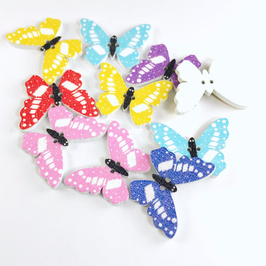 10 butterfly shaped wooden buttons that are assorted colours
