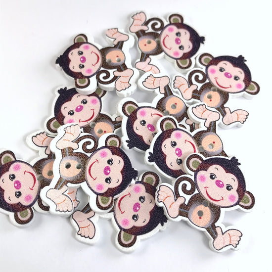 10 wooden buttons that look like monkeys