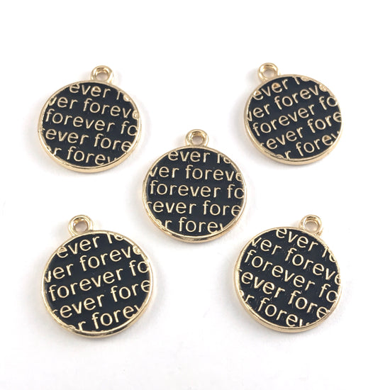 round black and gold charms with the word forever on them