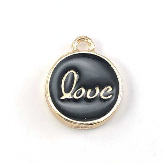 black and gold round jewerly charm with the word love on it